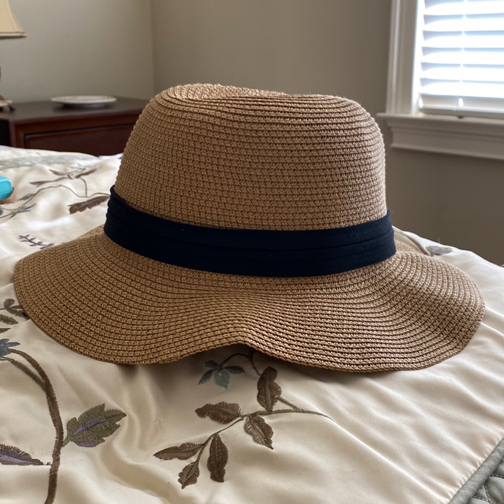 woman’s hat and tote